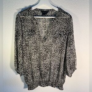 Jules & Leopold Animal Print 3/4 Sleeve Sheer Top with Notched Collar and Deep V